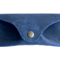 Soft Leather Eye Glasses Case in Navy Blue, closed, front view with embossed Hedonist logo and snap closure