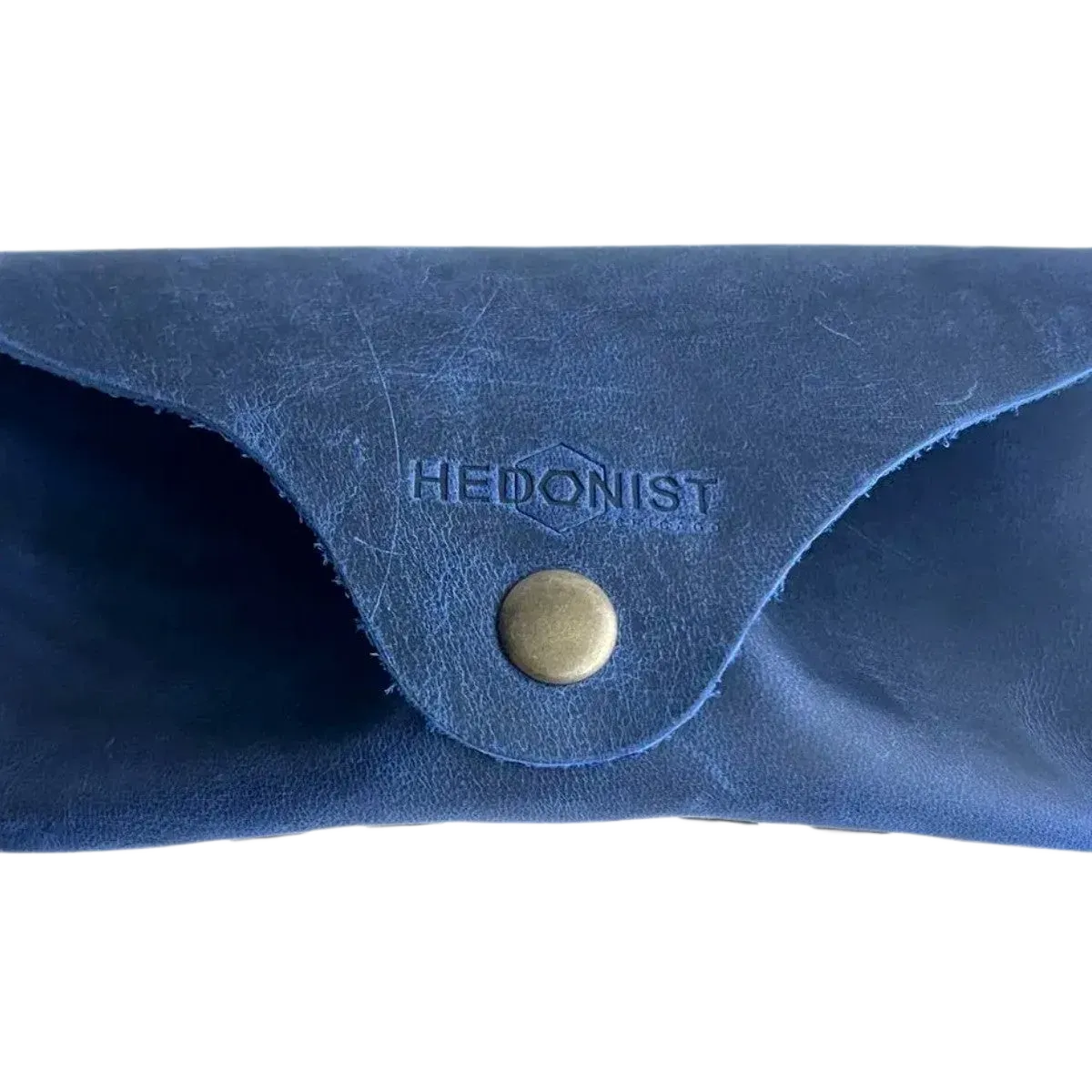 Soft Leather Eye Glasses Case in Navy Blue, closed, front view with embossed Hedonist logo and snap closure