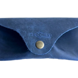Soft Leather Eye Glasses Case in Navy Blue, closed, front view with embossed Hedonist logo and snap closure