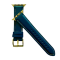 Blue padded leather Apple Watch band, texture and buckle detail close-up