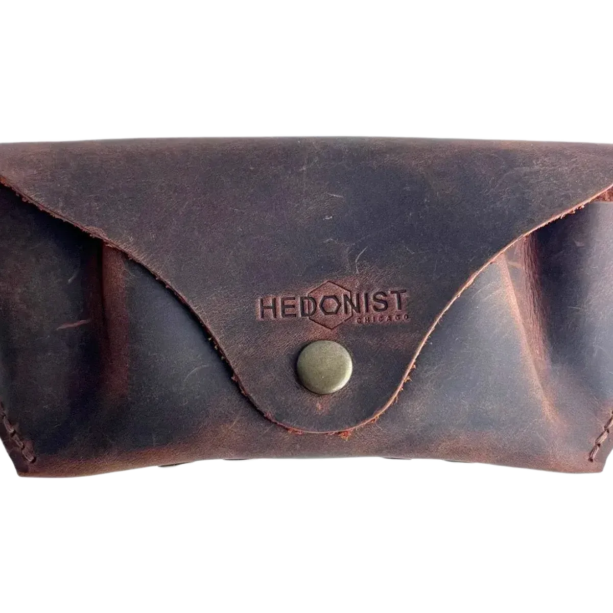 Soft Leather Eye Glasses Case in Brown, closed, front view with embossed Hedonist logo and snap closure