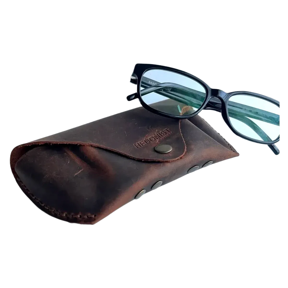 Soft Leather Eye Glasses Case in Brown with tinted-lens eyeglasses resting on top