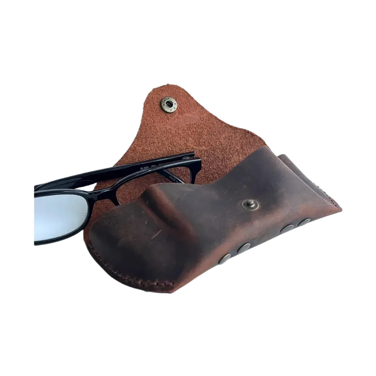 Soft Leather Eye Glasses Case in Brown, open, with black-framed eyeglasses beside it