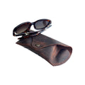 Soft Leather Eye Glasses Case in Brown with tortoiseshell sunglasses resting on top