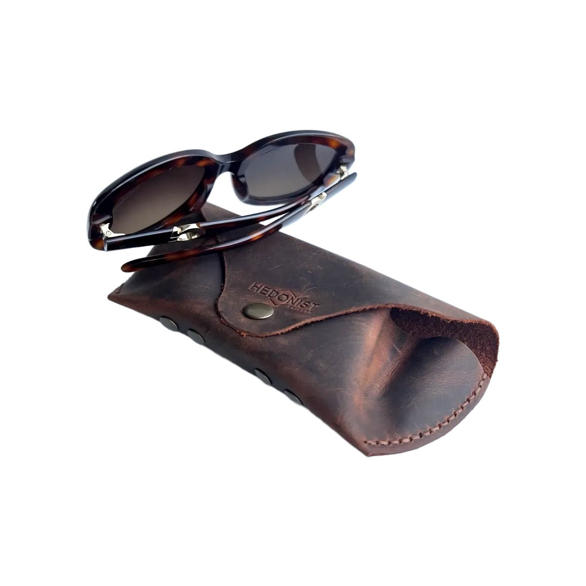 Soft Leather Eye Glasses Case in Brown with tortoiseshell sunglasses resting on top