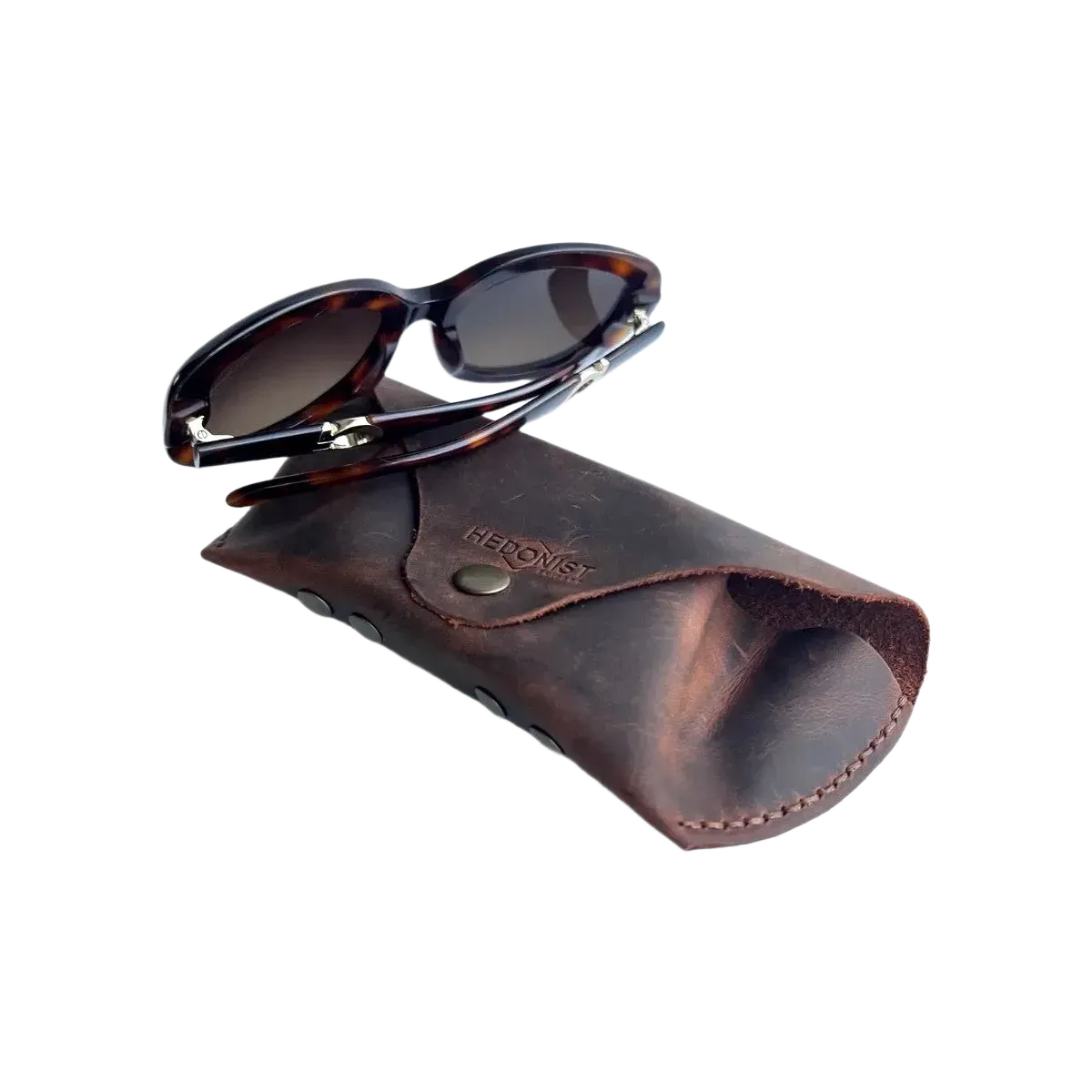 Soft Leather Eye Glasses Case in Brown with tortoiseshell sunglasses resting on top