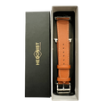 Brown leather Apple Watch band, packaging close-up