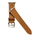 Brown leather Apple Watch band, texture and buckle detail close-up
