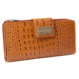 Brown croco-embossed leather travel wallet closed, front flap with gold-tone Hedonist Chicago plaque