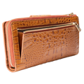 Rear coin zip compartment on the brown croco-embossed leather travel wallet