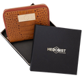 Small brown croco-embossed zip wallet for women, presented in branded box