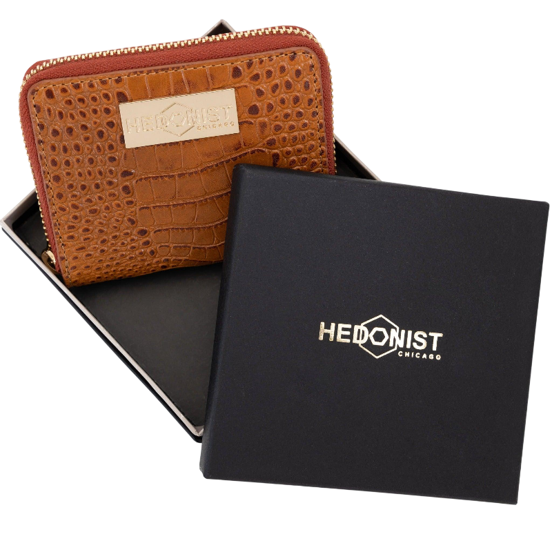 Small brown croco-embossed zip wallet for women, presented in branded box