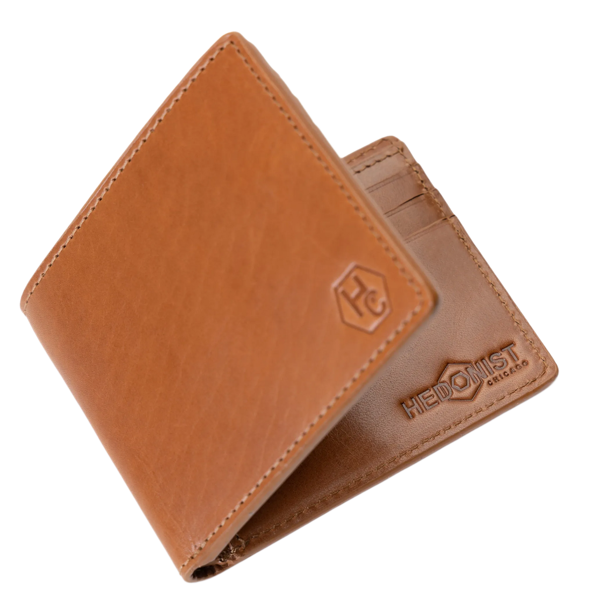 Brown leather bifold wallet, close-up of hexagonal HC logo emboss
