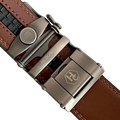 Brown leather dress ratchet belt with gunmetal frame buckle, hardware close-up