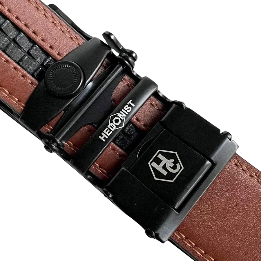 Brown leather ratchet belt with black plate buckle, hardware close-up