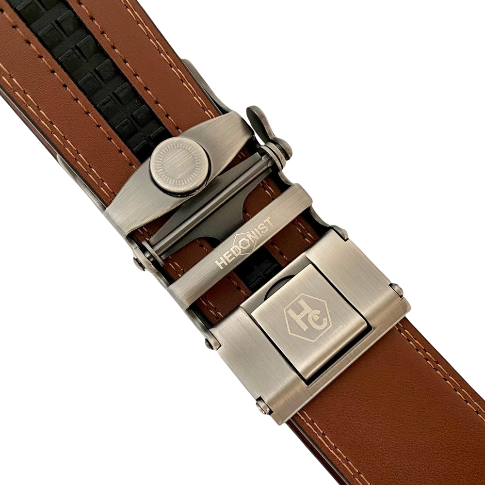 Brown leather ratchet belt with gunmetal buckle, hardware close-up