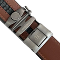 Brown leather ratchet belt with long gunmetal rectangle buckle, back view