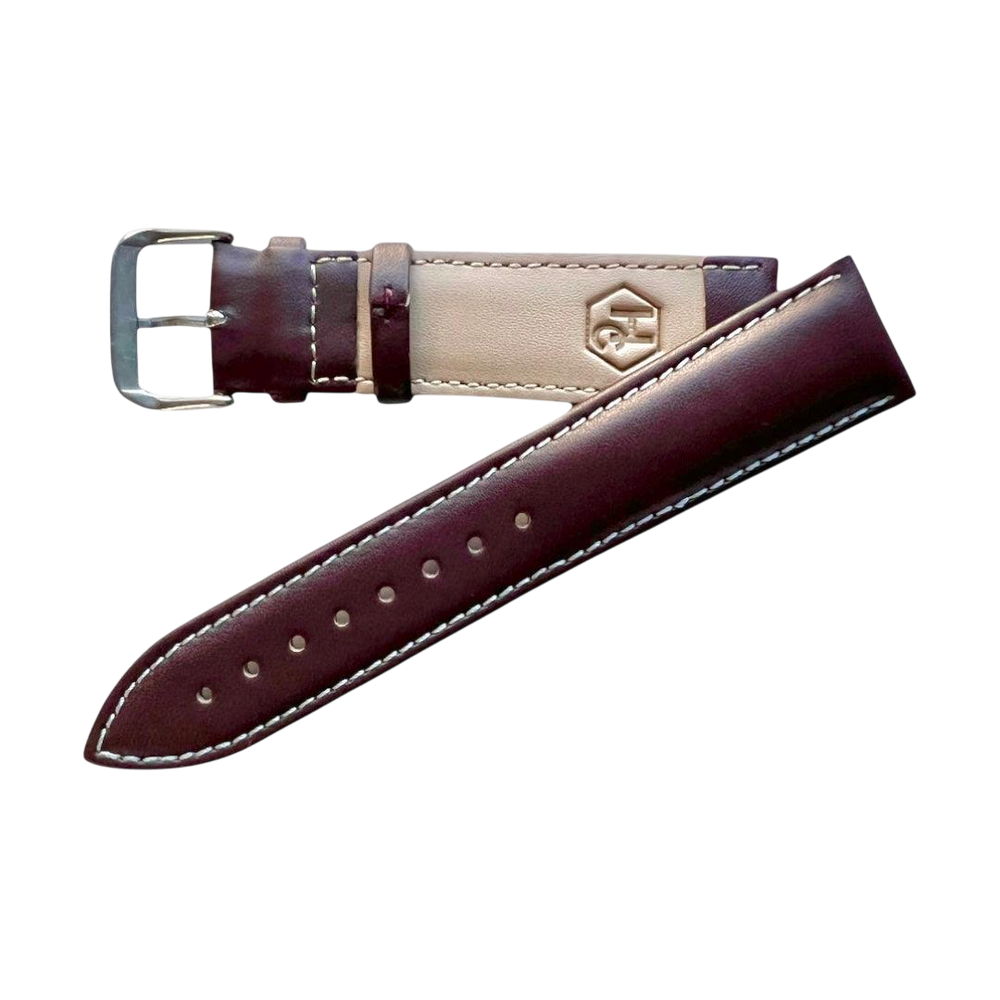 Brown top-grain leather watch band, buckle detail close-up