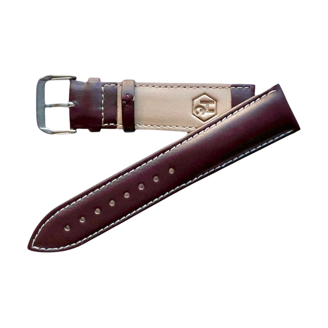 Brown top-grain leather watch band, buckle detail close-up