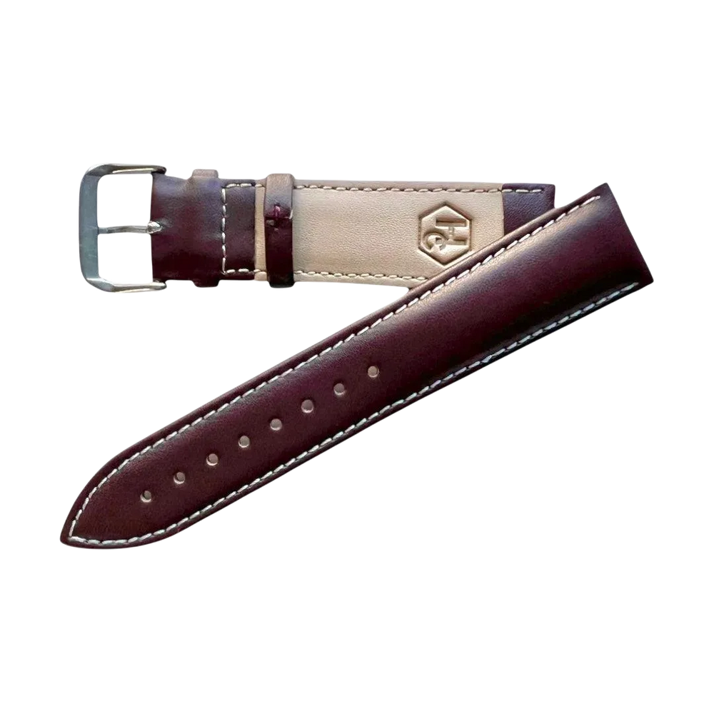 Brown top-grain leather watch band, buckle detail close-up