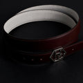 Side view on women's reversible design leather belt - brown - Hedonist Chicago - close-up view (1"/1.3", reversible with white)