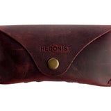 Soft Leather Eye Glasses Case in Burgundy, closed, front view with embossed Hedonist logo and snap closure