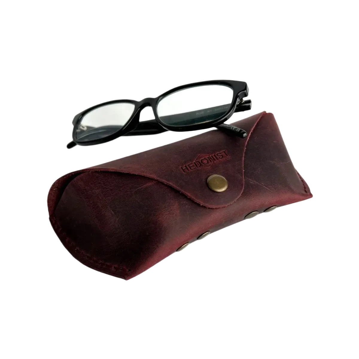 Soft Leather Eye Glasses Case in Burgundy with black-framed eyeglasses resting on top