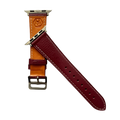 Burgundy leather Apple Watch band, texture and buckle detail close-up