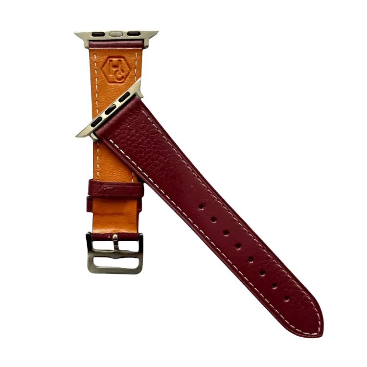 Burgundy leather Apple Watch band, texture and buckle detail close-up