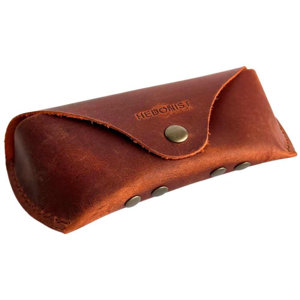 Soft Leather Eye Glasses Case in Cognac, angled view showing stitched edge and rivets