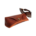 Soft Leather Eye Glasses Case in Cognac with tortoiseshell sunglasses beside it