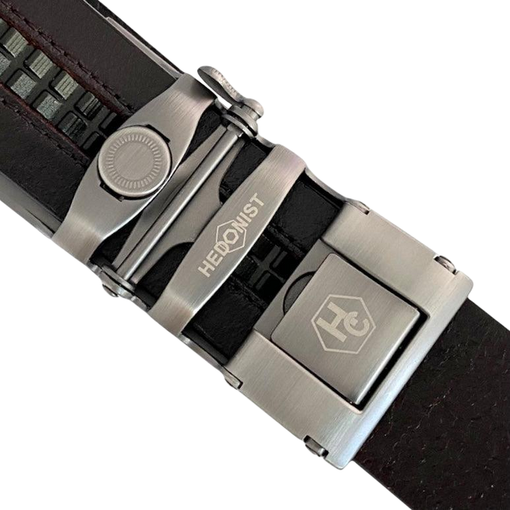 Dark brown croco leather ratchet belt with long gunmetal rectangle buckle, hardware close-up
