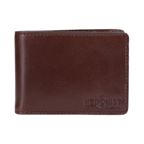 A dark brown leather bifold wallet with a debossed HEDONIST logo on the bottom right corner, shown against a plain white background.