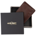 A dark brown leather wallet by Hedonist Chicago, shown partially inside its open presentation box next to its black lid, which features gold foil branding.