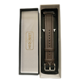 Dark brown padded leather Apple Watch band, presented in gift box