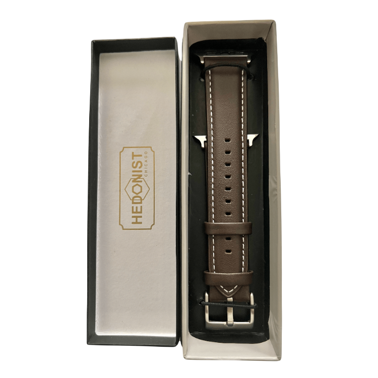 Dark brown padded leather Apple Watch band, presented in gift box