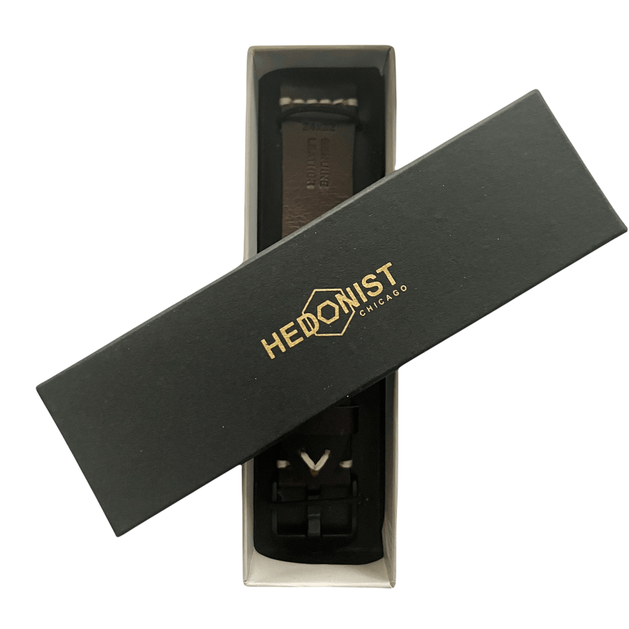 Dark brown pull-up leather Apple Watch band presented in gift box