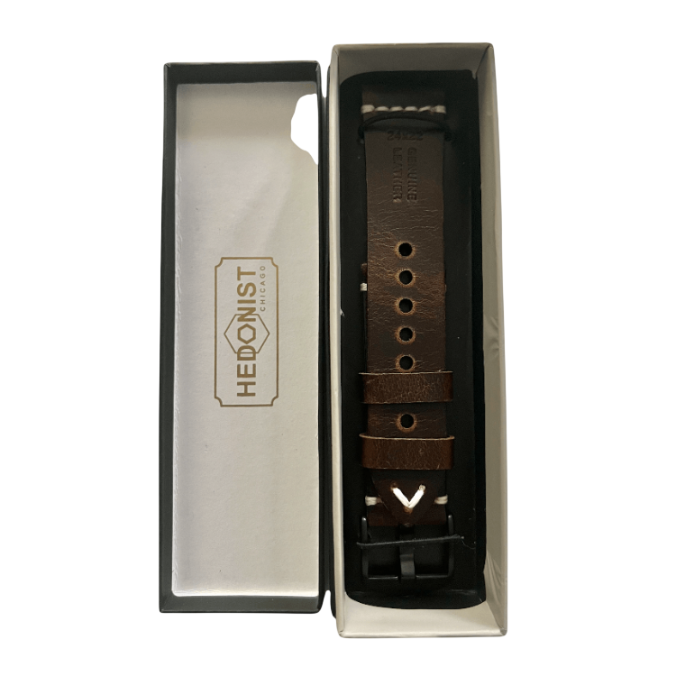 Dark brown pull-up leather Apple Watch band packaged for shipping