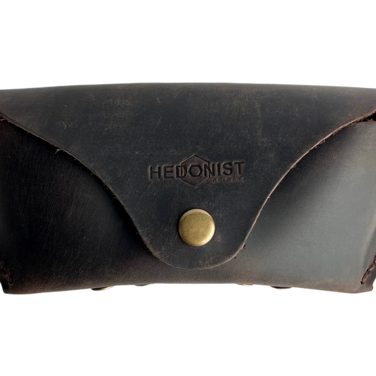 Soft Leather Eye Glasses Case in Dark Brown, closed, front view with embossed Hedonist logo and snap closure