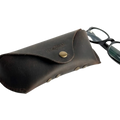 Soft Leather Eye Glasses Case in Dark Brown with black-framed eyeglasses beside it