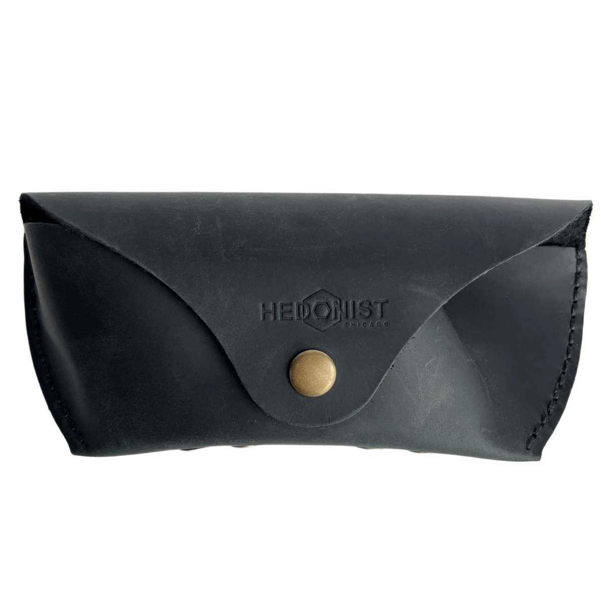 Soft Leather Eye Glasses Case in Black, closed, front view with embossed Hedonist logo and snap closure
