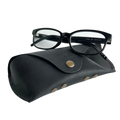 Soft Leather Eye Glasses Case in Black with black-framed eyeglasses resting on top