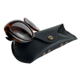 Soft Leather Eye Glasses Case in Black with tortoiseshell sunglasses leaning against it