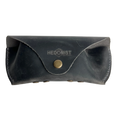 Soft Leather Eye Glasses Case in Black Washed, closed, front view showing weathered grain and embossed Hedonist logo