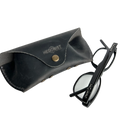 Soft Leather Eye Glasses Case in Black Washed with black cat-eye glasses leaning beside it
