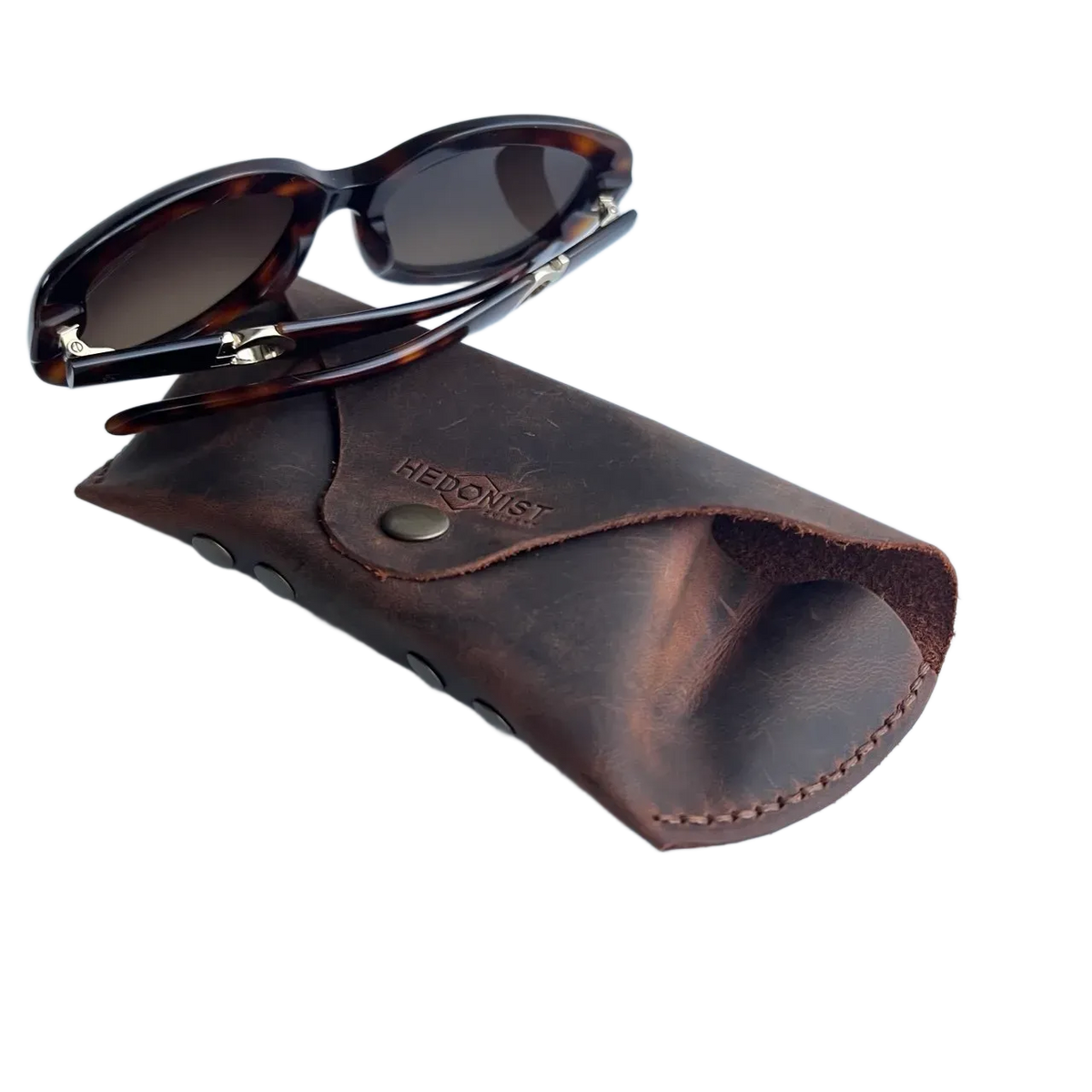 Soft Leather Eye Glasses Case in Brown with tortoiseshell sunglasses resting on top