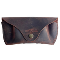 Soft Leather Eye Glasses Case in Brown, closed, front view with embossed Hedonist logo and snap closure