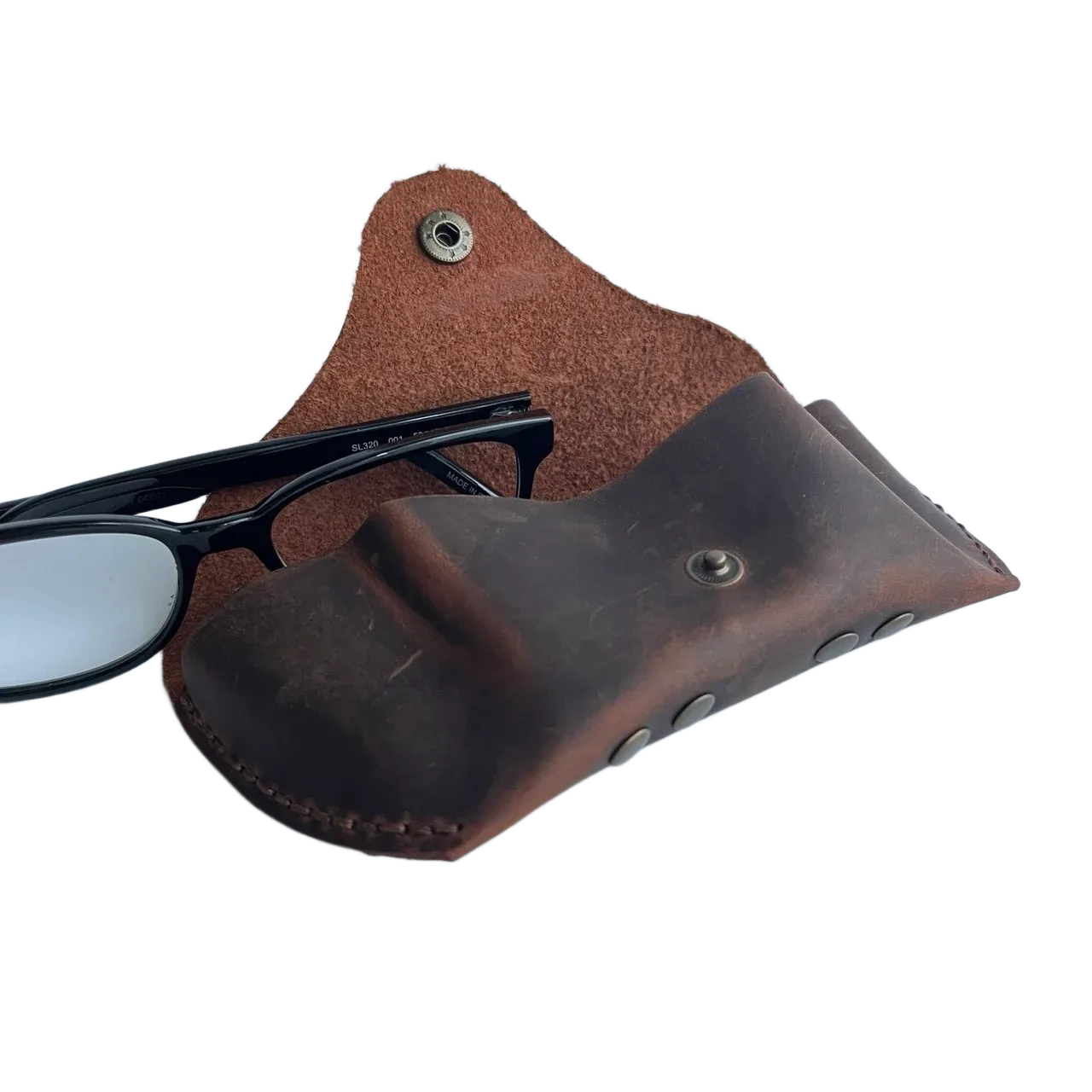 Soft Leather Eye Glasses Case in Brown, open, with black-framed eyeglasses beside it