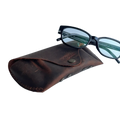 Soft Leather Eye Glasses Case in Brown with tinted-lens eyeglasses resting on top