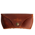 Soft Leather Eye Glasses Case in Cognac, closed, front view with embossed Hedonist logo and snap closure